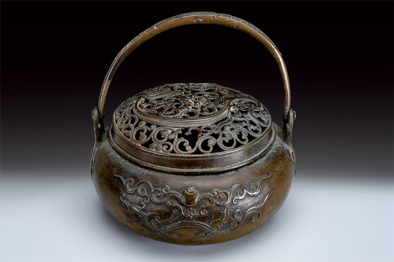 Scaldino in bronzo firmato da Jiu Bingwei