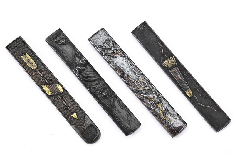 Lotto di quattro impugnature da kozuka