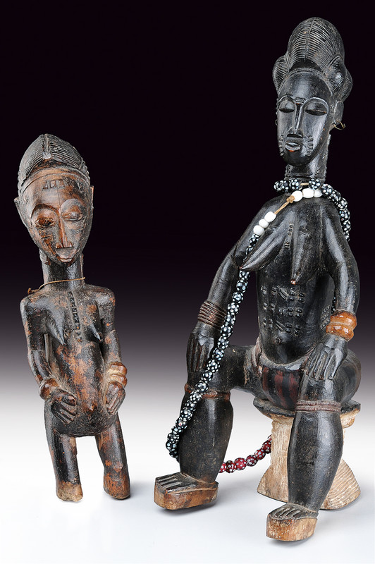 Lotto di due statue in legno