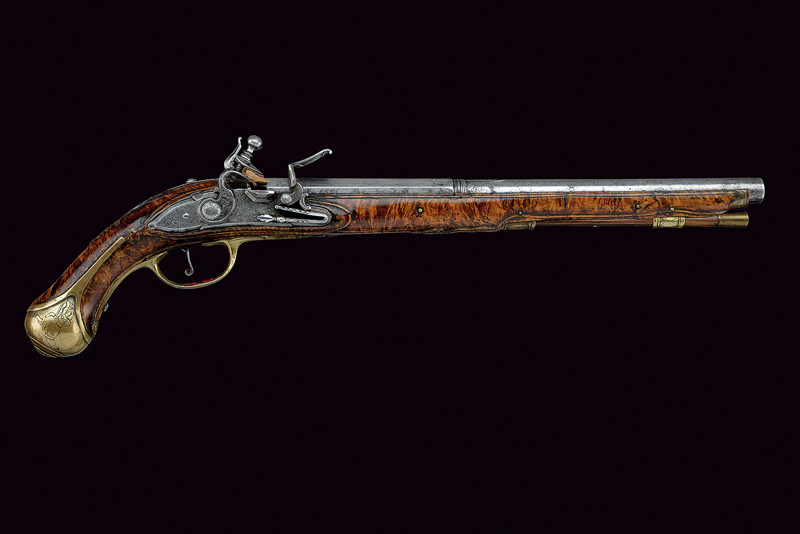 Pistola a pietra focaia incisa a grottesche