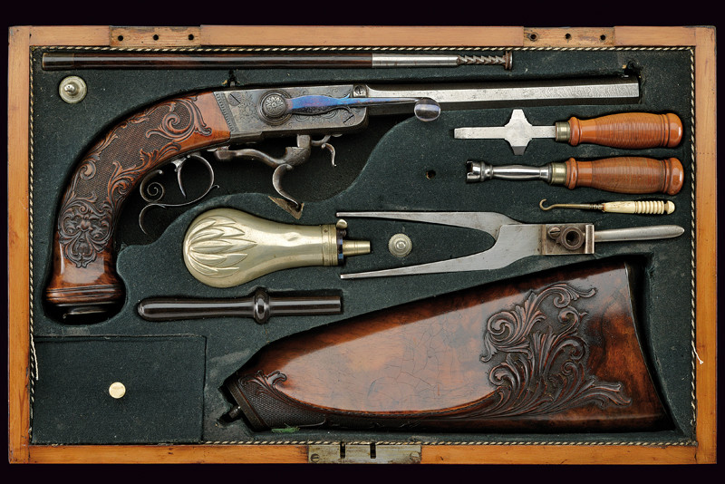 Straordinaria pistola a luminello a retrocarica di Schilling, con cassetta e calcio smontabile