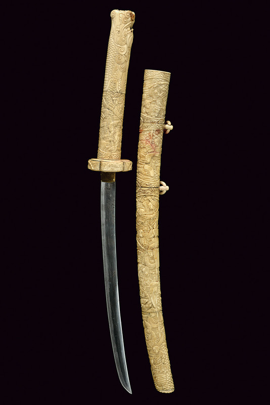 Wakizashi con fornimenti intagliati