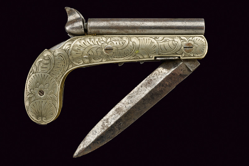 Rara pistola a luminello con coltello pieghevole