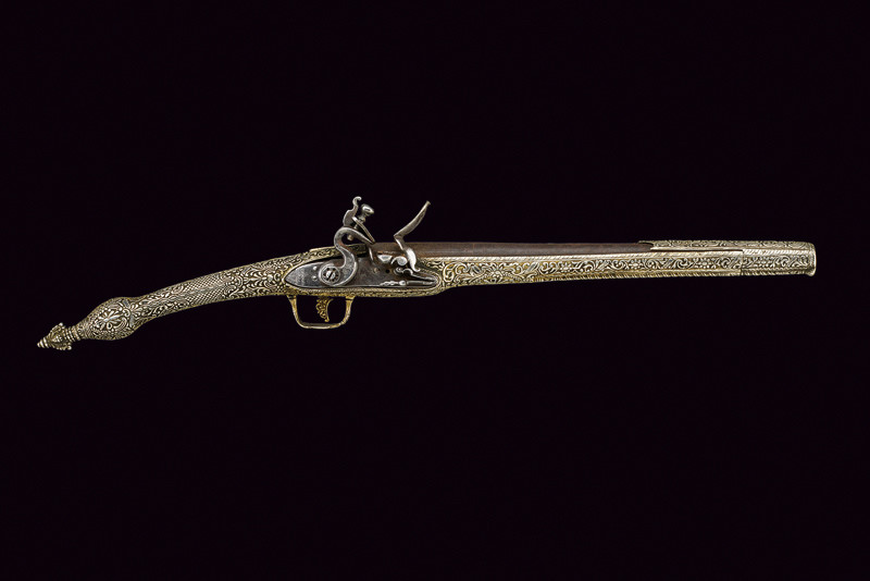 Pistola a pietra focaia in argento dell'Epiro