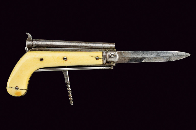 Rara pistola a luminello con coltello