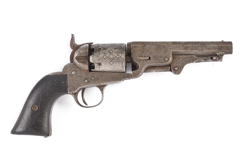 Revolver tipo Colt