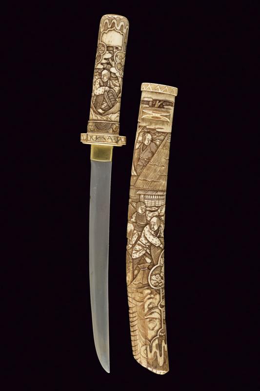 Tanto decorato ad intaglio