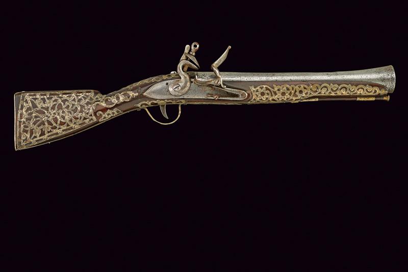 Raro tromboncino a pietra focaia decorato in argento