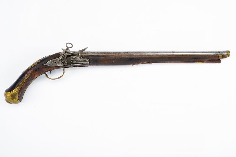 Pistola a pietra focaia alla romana