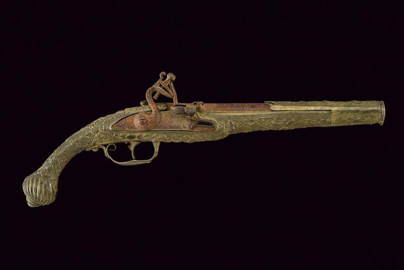 Pistola a pietra focaia in argento