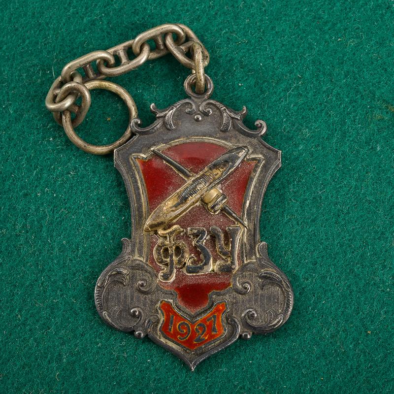 Distintivo per scuola tessile