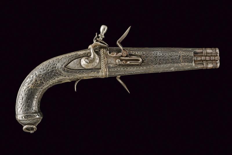 Pistola a pietra focaia a due canne sovrapposte