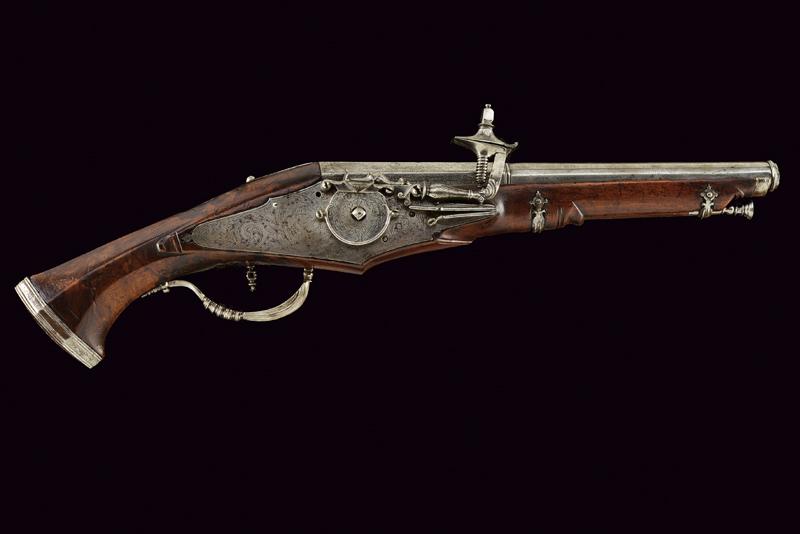 Pistola a ruota incisa