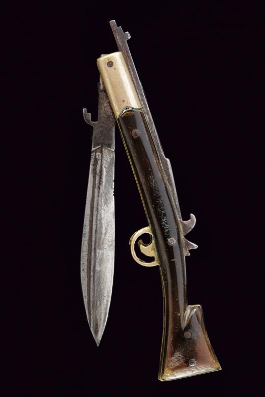 Coltello pieghevole a forma di fucile